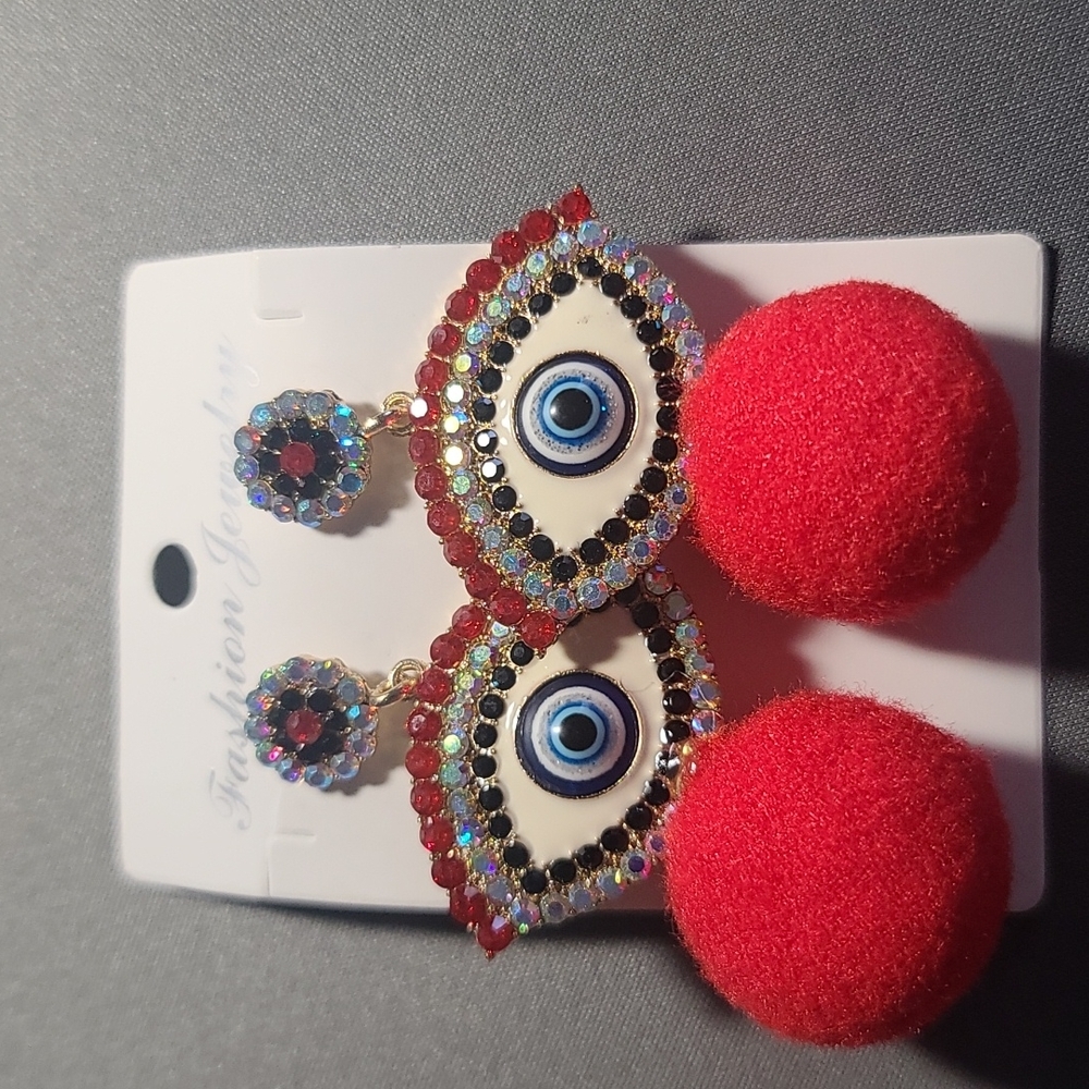 Eye Fleece Ball Earrings